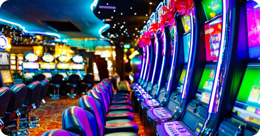 Imagen de con máquinas slots brillantes, luces de neón en un casino moderno